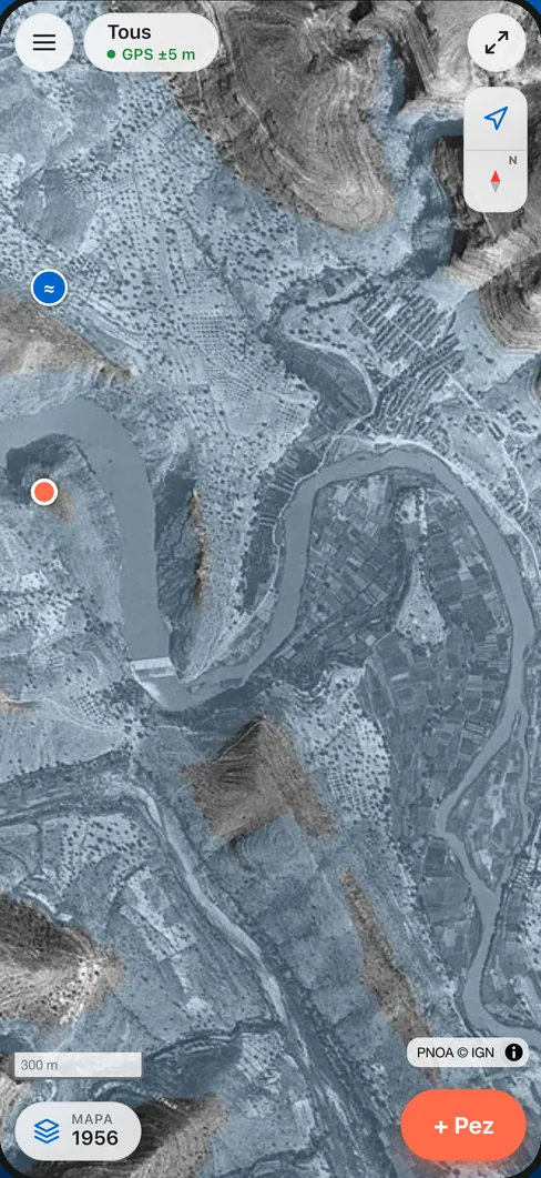 La app con Tous en la foto aérea de 1956: el río y los bancales antes de la presa